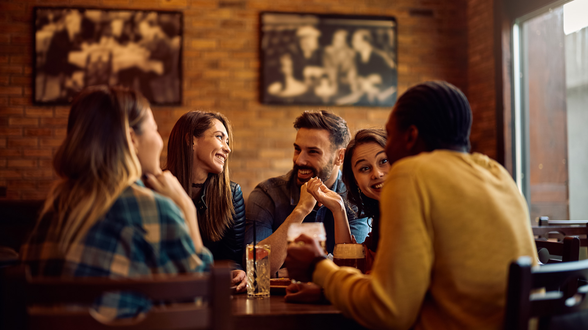a group of people sitting around a table