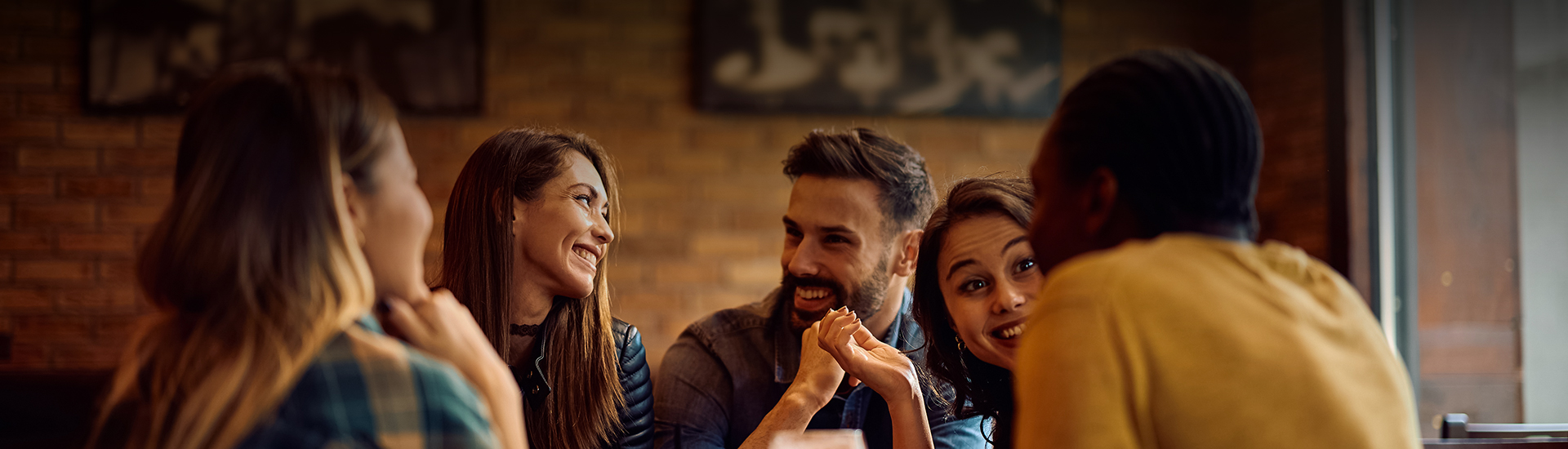 a group of people sitting at a table