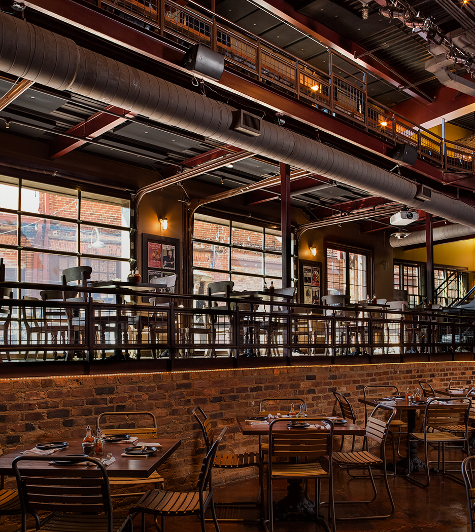 a restaurant with tables and chairs