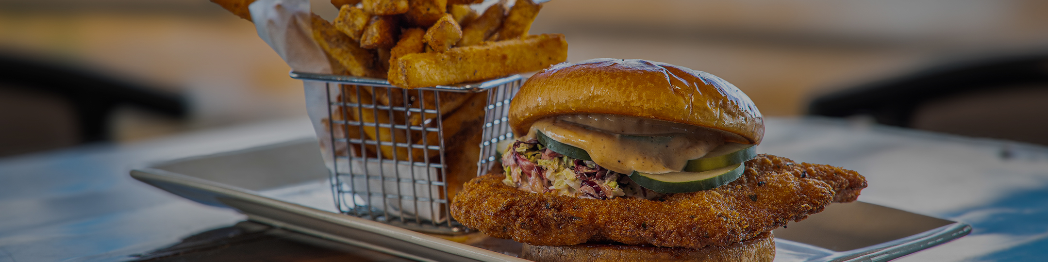 a burger and fries on a plate