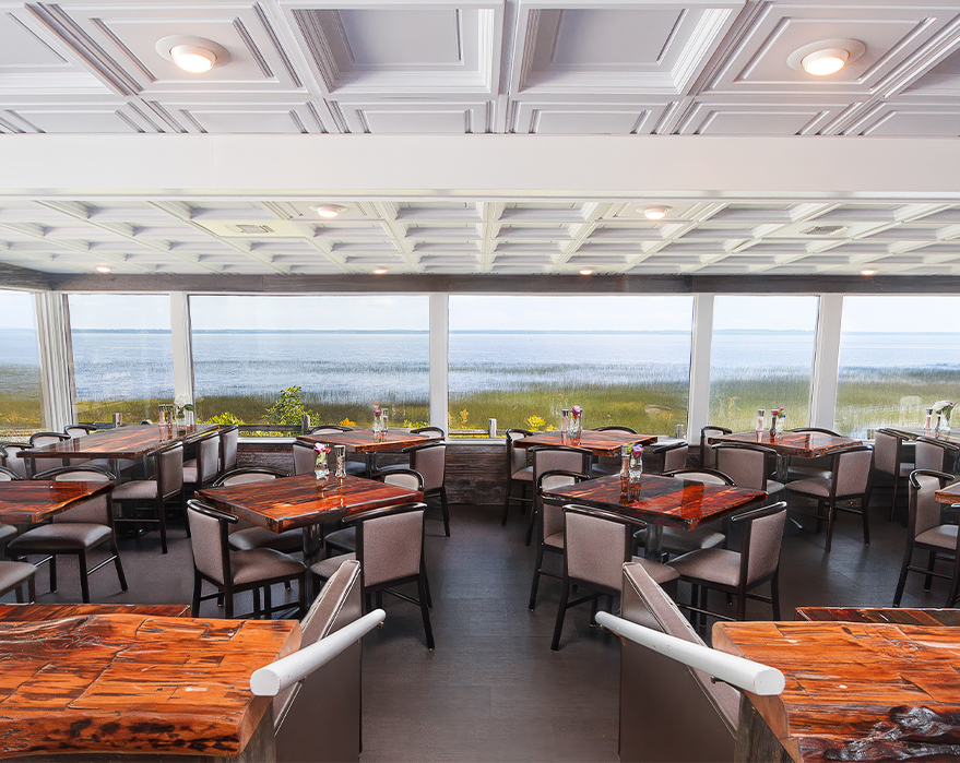 a room with tables and chairs