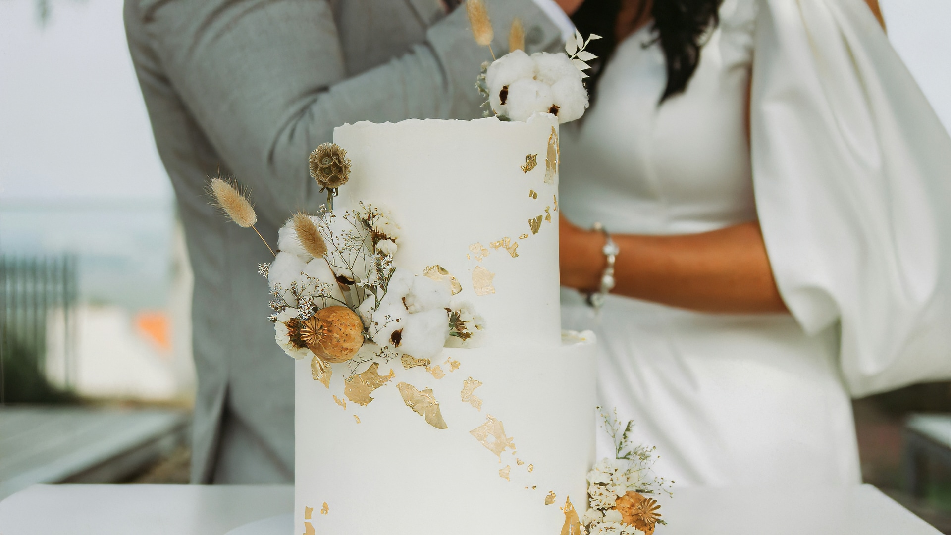 a cake with gold leaf decorations
