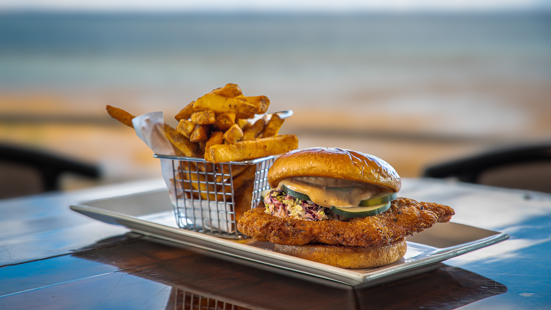 a plate of food with a burger and fries