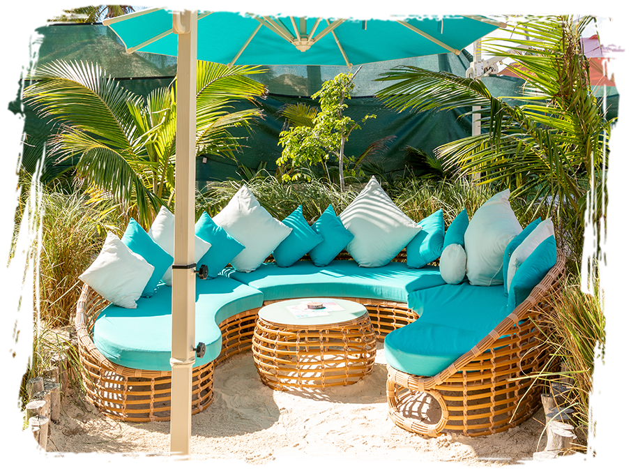a circular seating area with a table and chairs