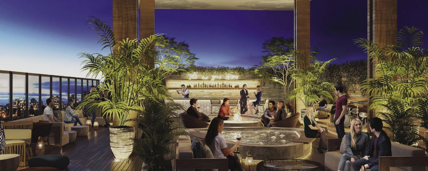 a group of people sitting around a fire pit