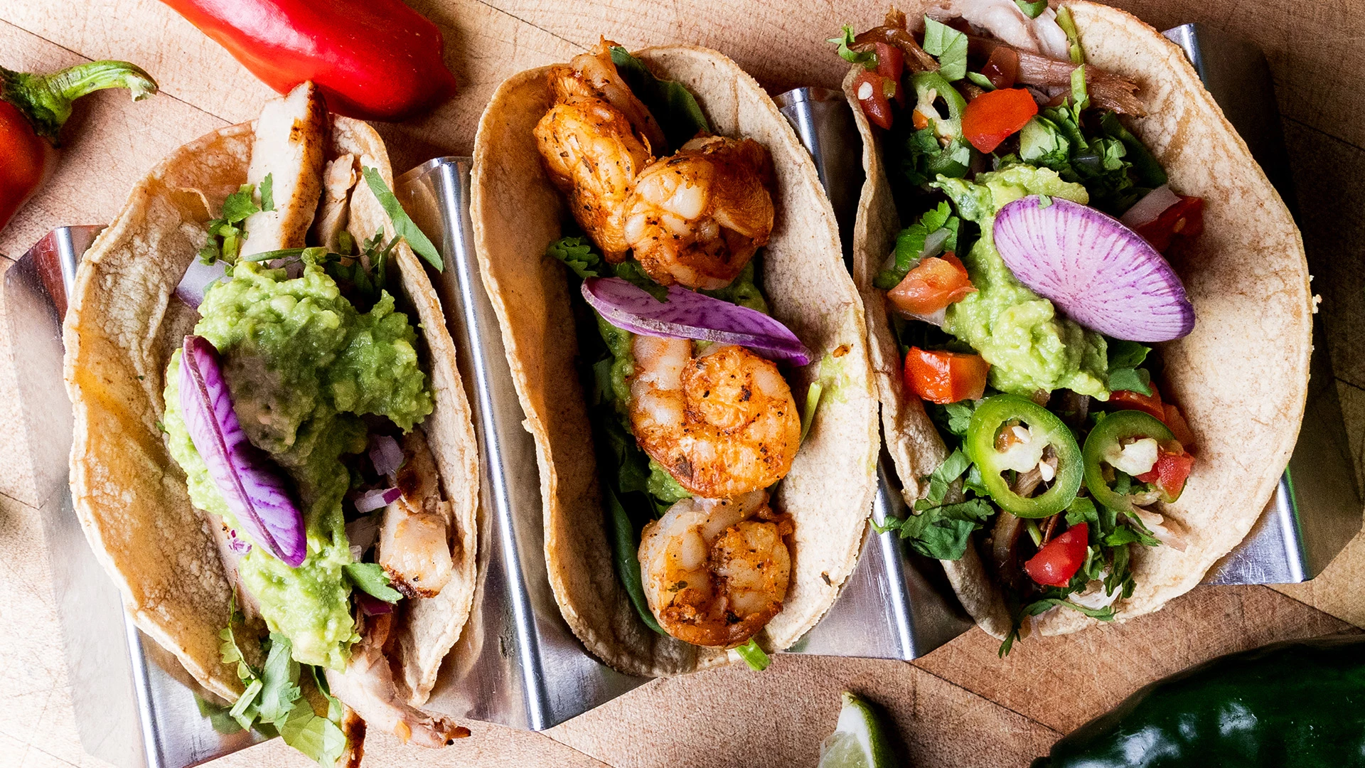 a group of shrimp tacos