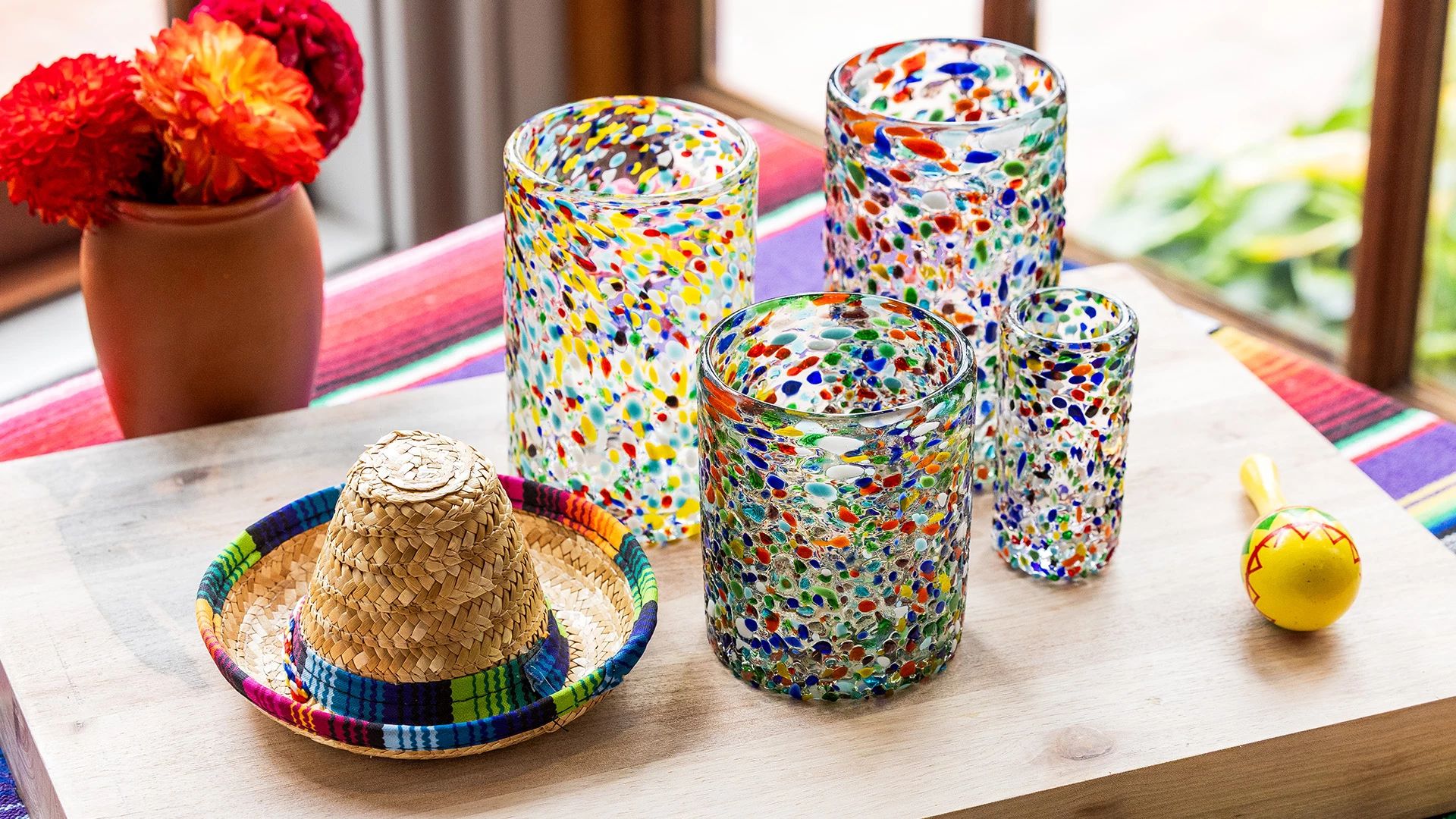 a group of glasses and a hat
