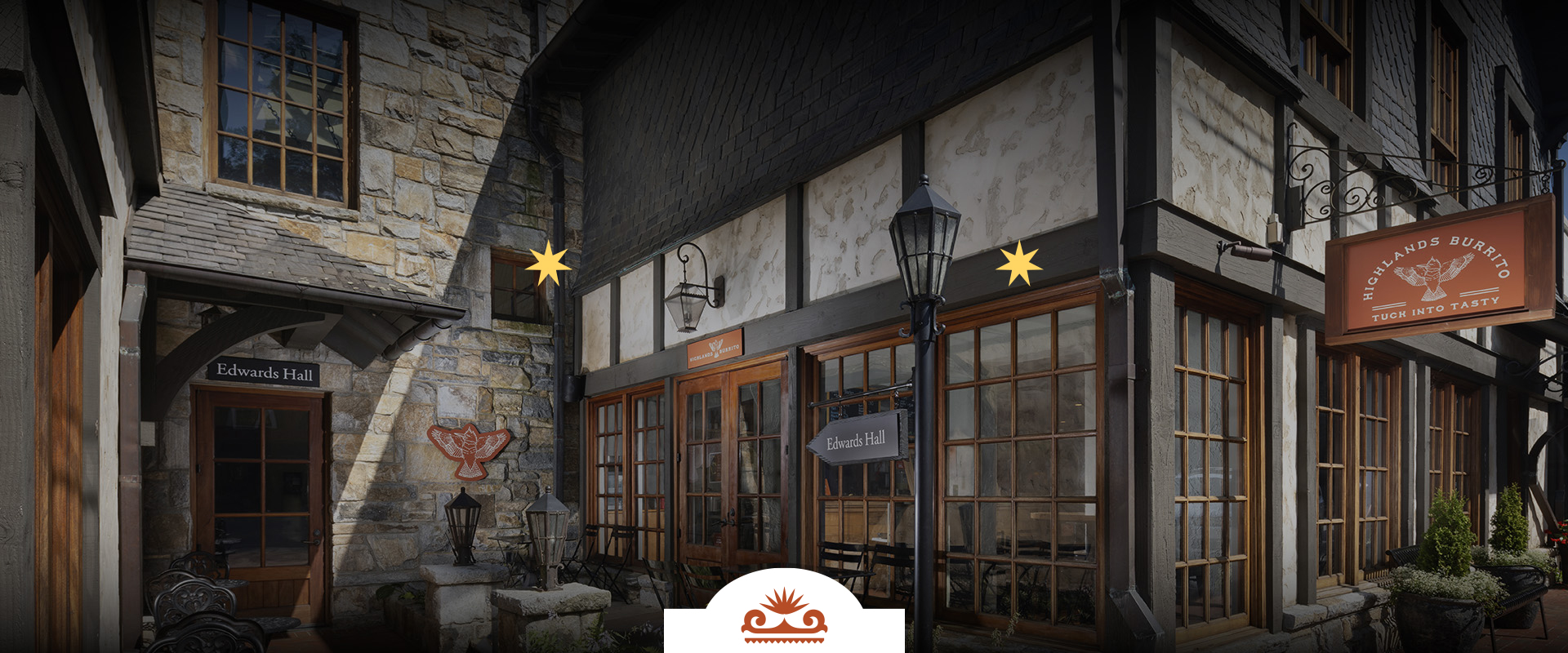 a building with a sign and a sign post