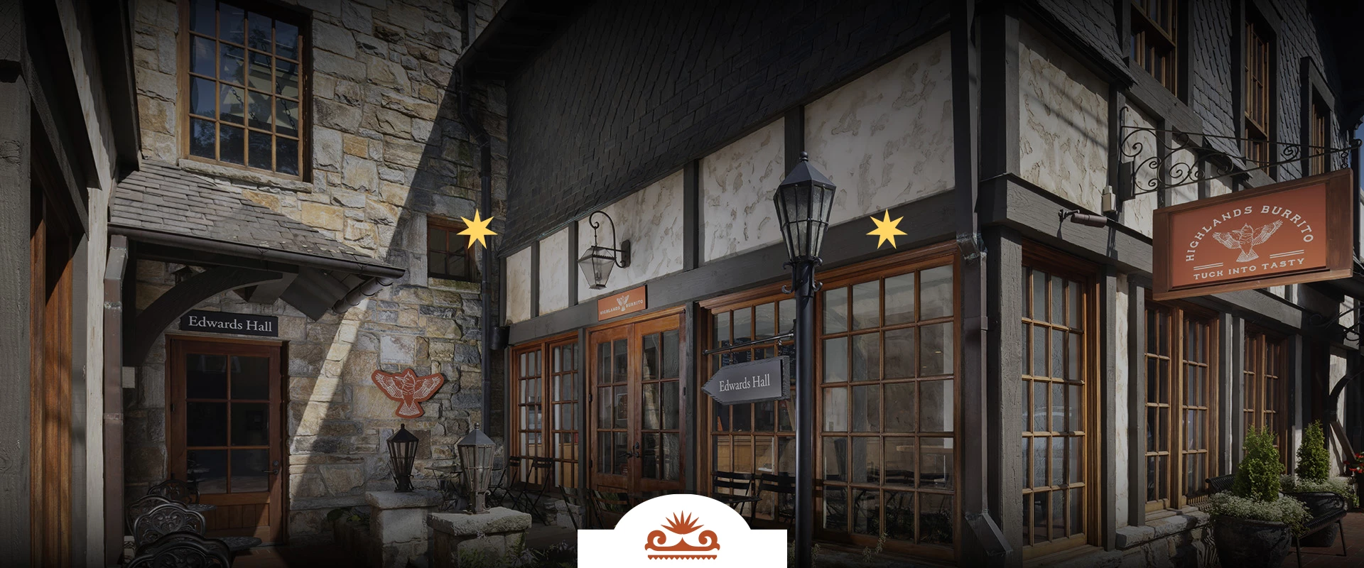 a building with a sign and a sign post