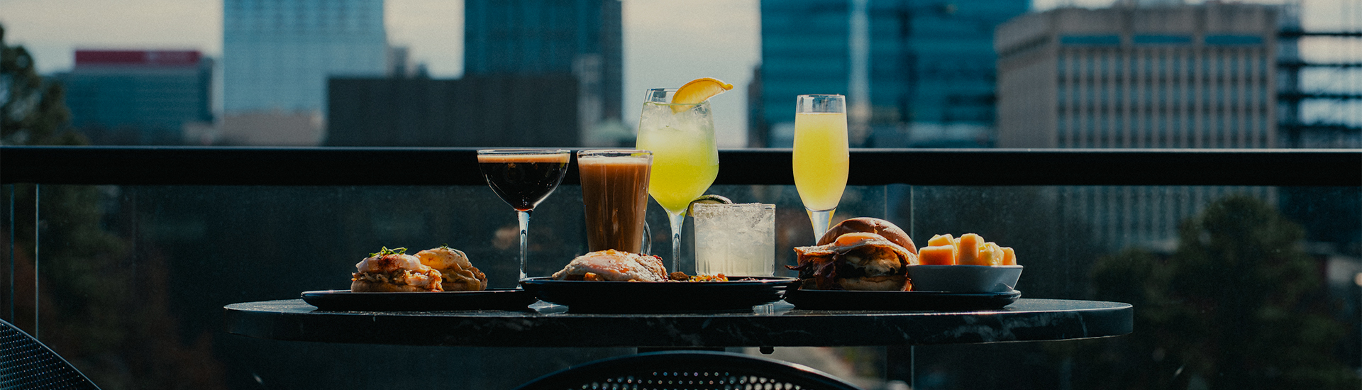 a table with drinks and food on it