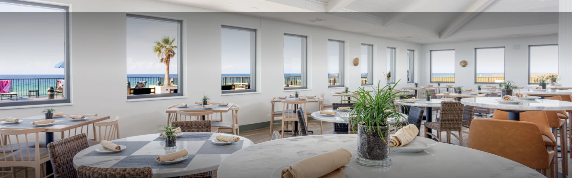 a room with tables and chairs