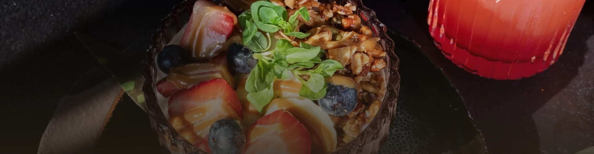 a bowl of food with green leaves