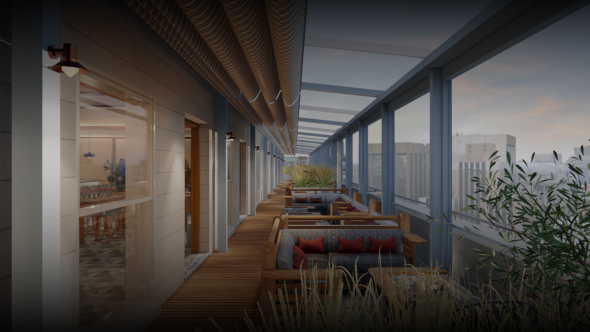 a long room with a wood floor and windows