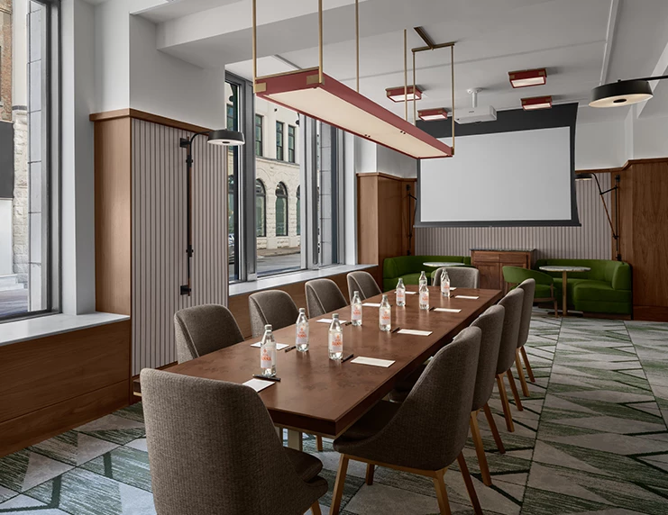 a room with a table and chairs