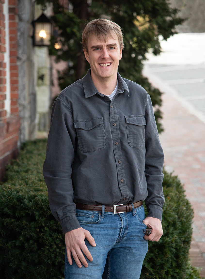 a man smiling at camera