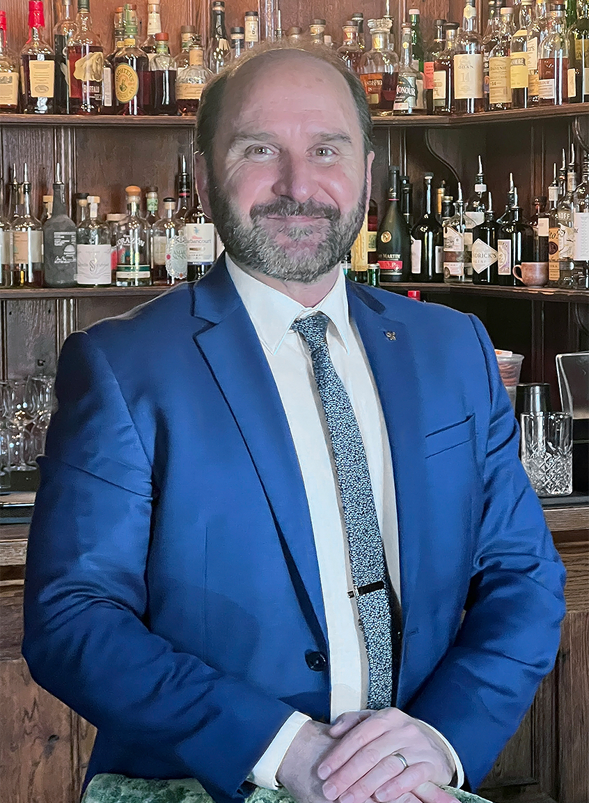 a man in a blue suit