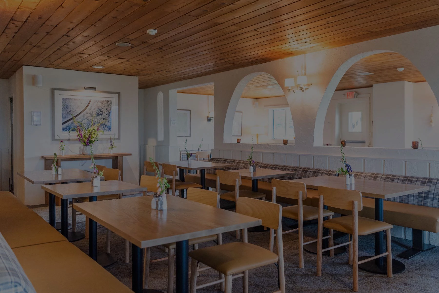 a room with tables and chairs