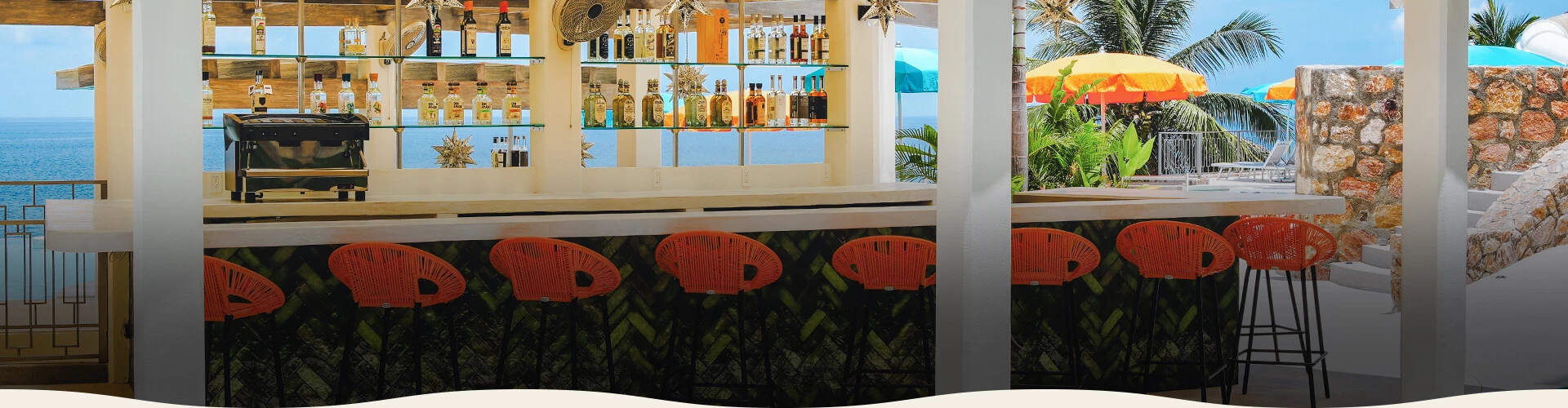 a bar with bottles of alcohol