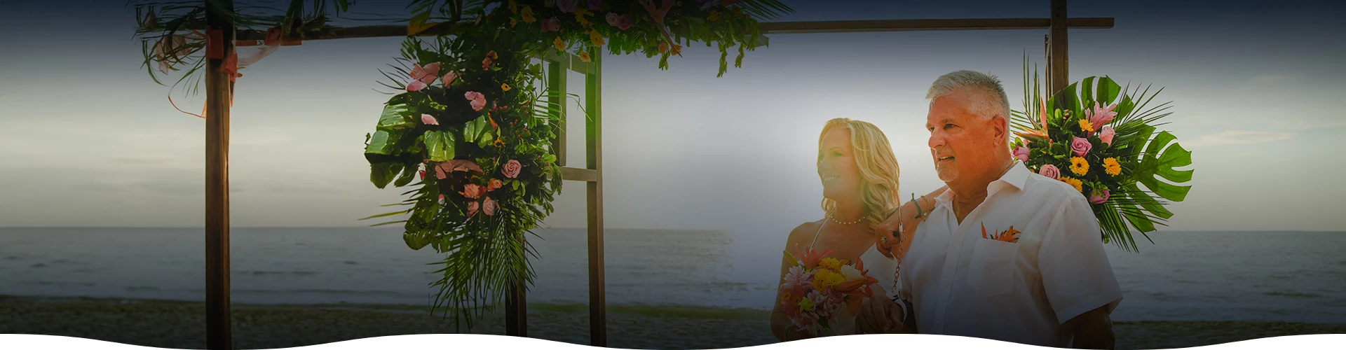 a woman smiling at a wedding