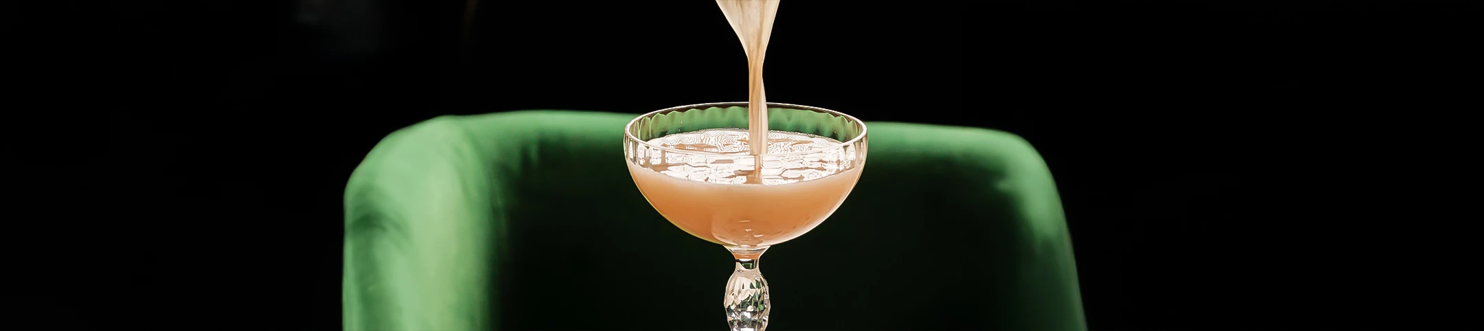 a glass with liquid in it