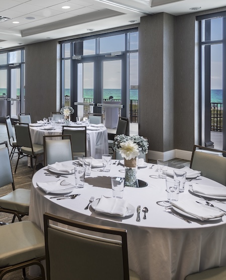 a round table set for a wedding reception