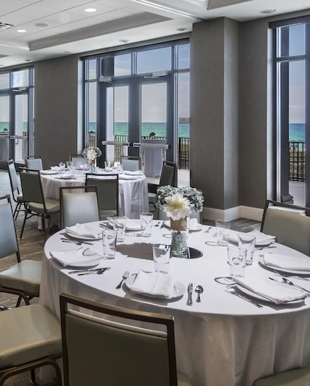 a round table set for a wedding reception