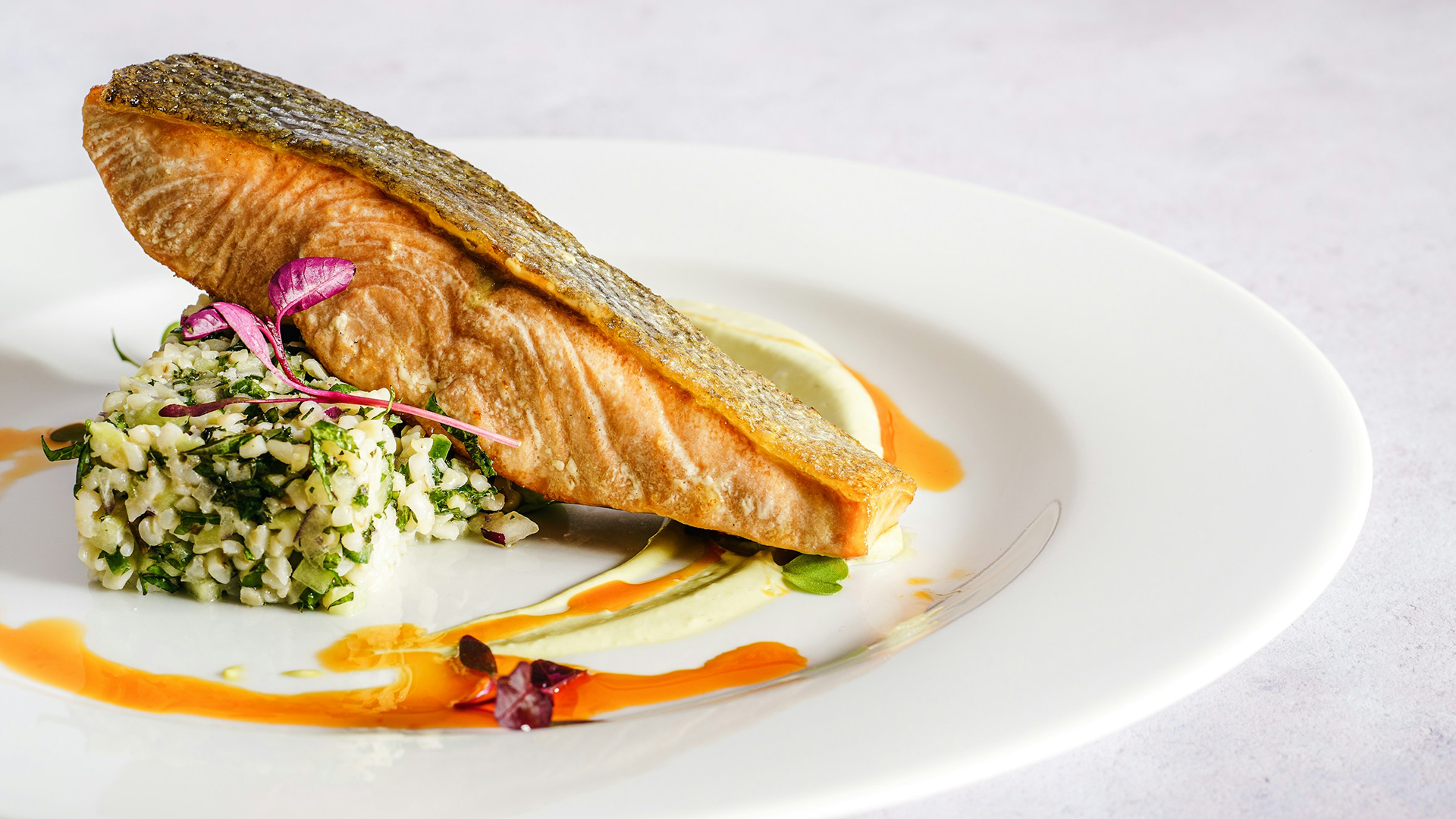 a plate of food on a white surface
