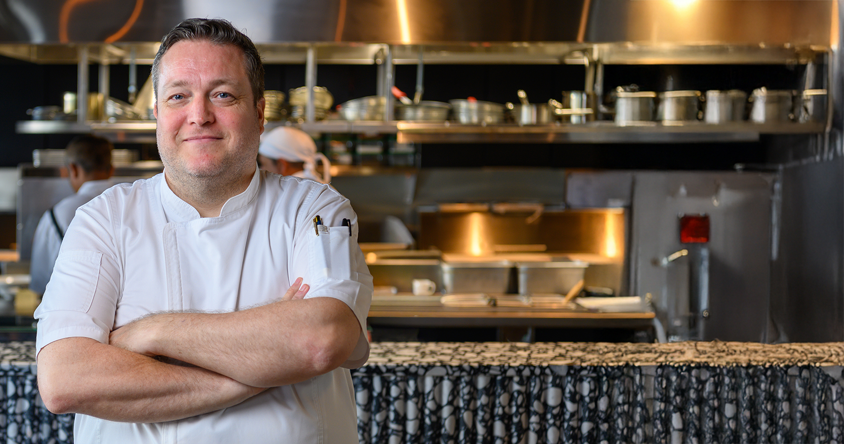 a man in a chef's uniform