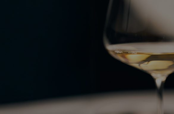 a close up of a glass of wine