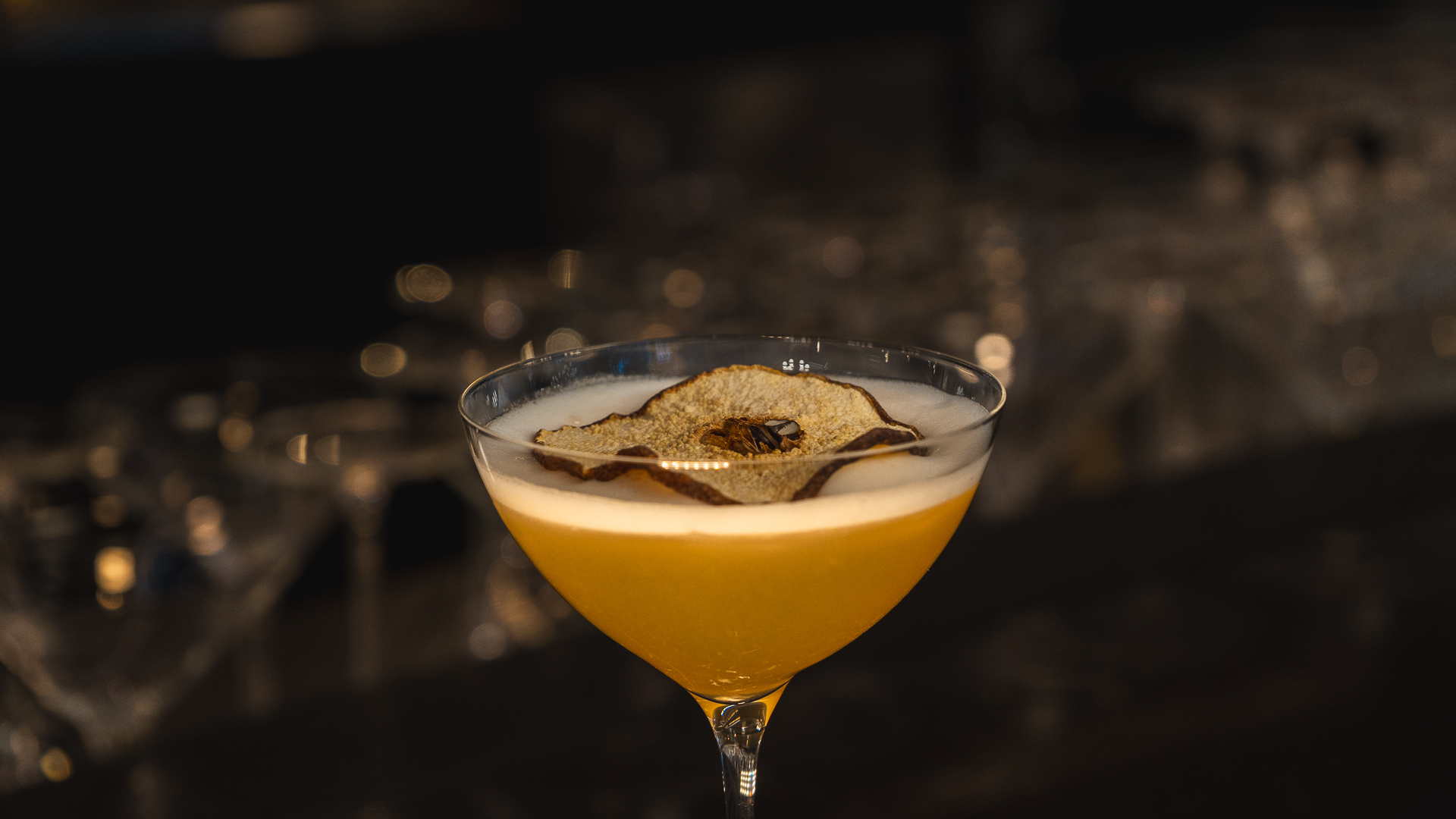 a glass with a drink in it