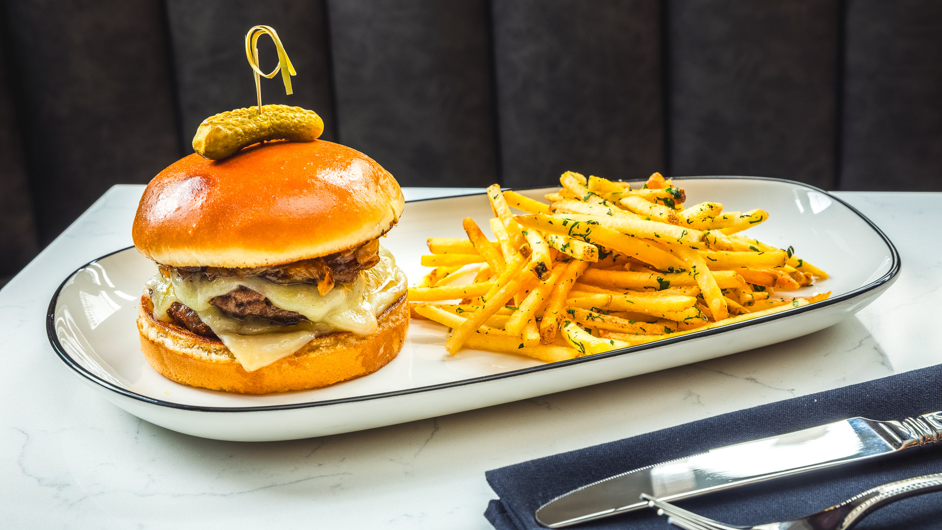 a burger and fries on a plate