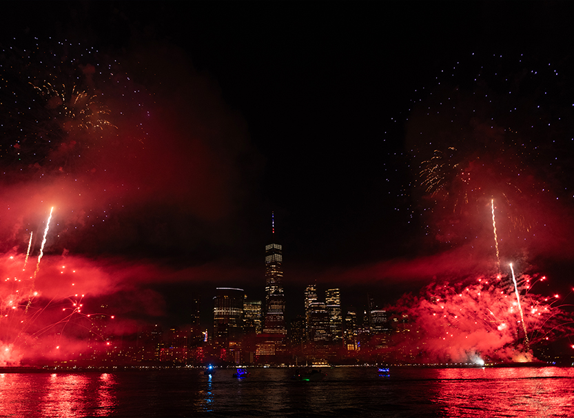 fireworks over a city at night