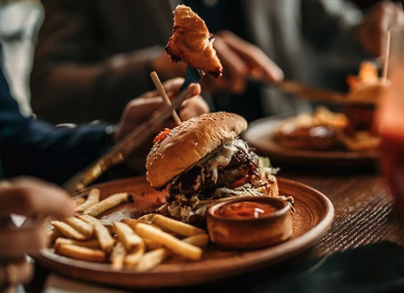 a plate of food with a burger and fries