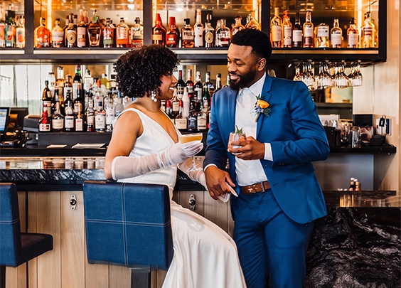 a man and woman in a bar