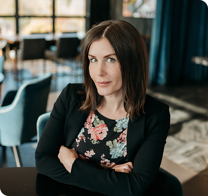 a woman with arms crossed