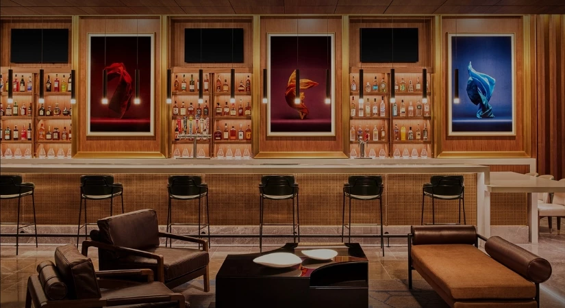 a bar with chairs and a table