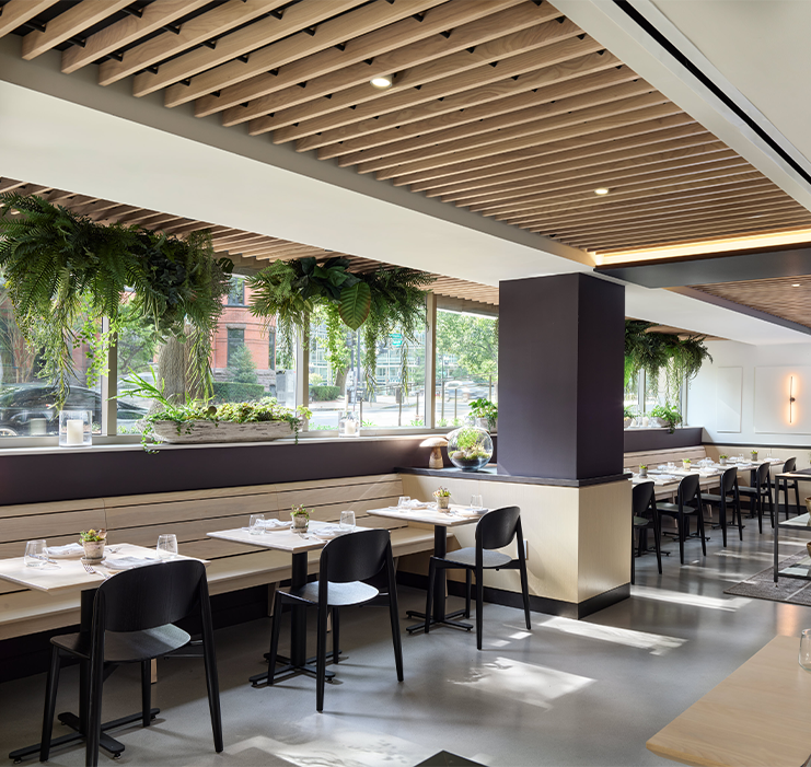 a restaurant with tables and chairs