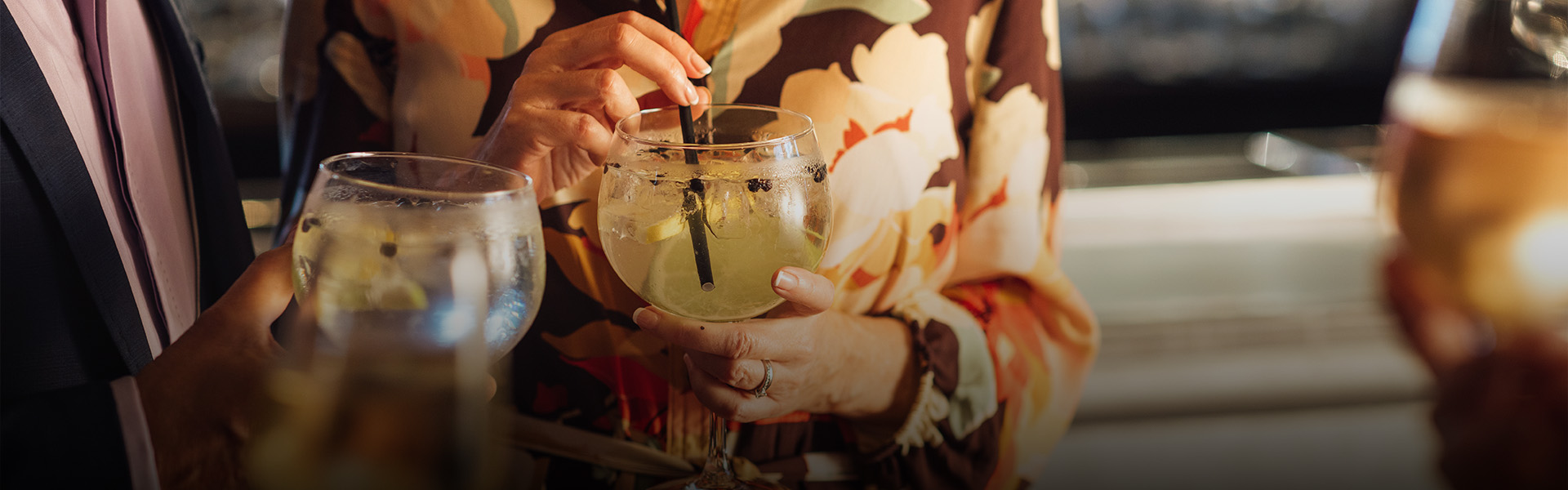 a person holding a drink