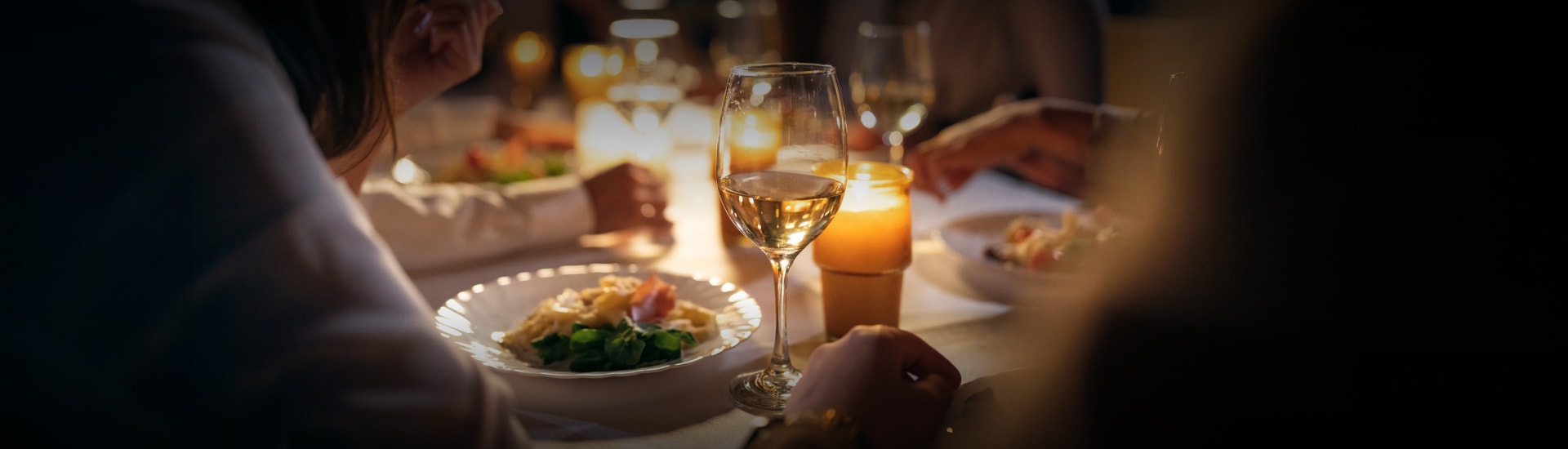 a glass of wine on a table