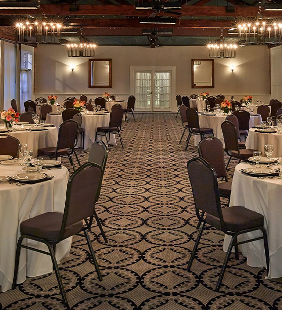 a room with tables and chairs