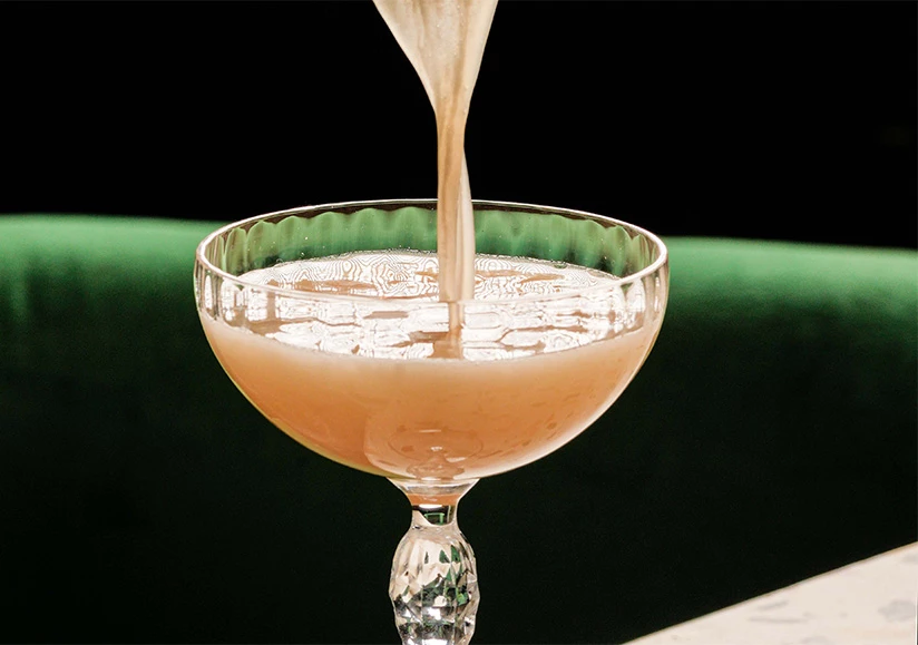 a glass with liquid in it