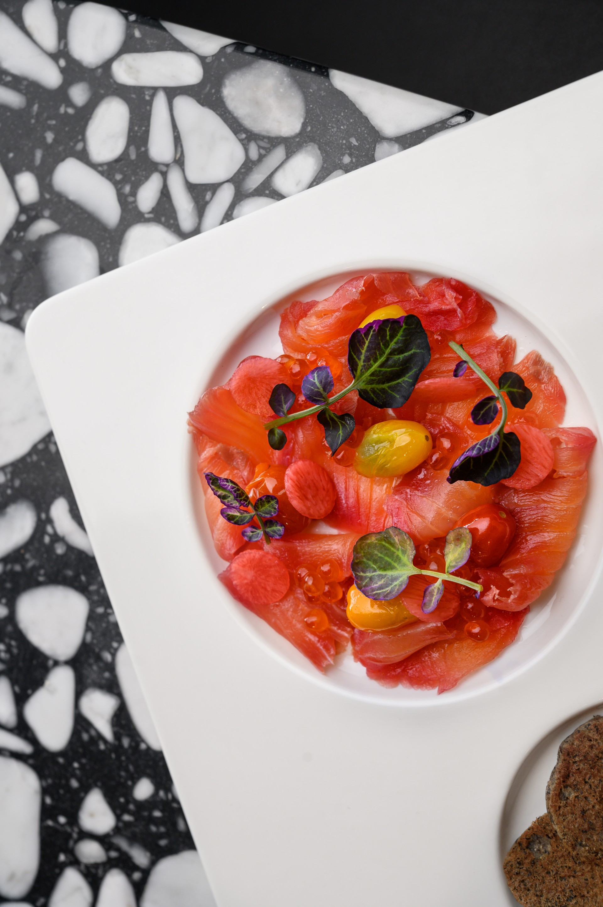 a plate of food on a marbled surface