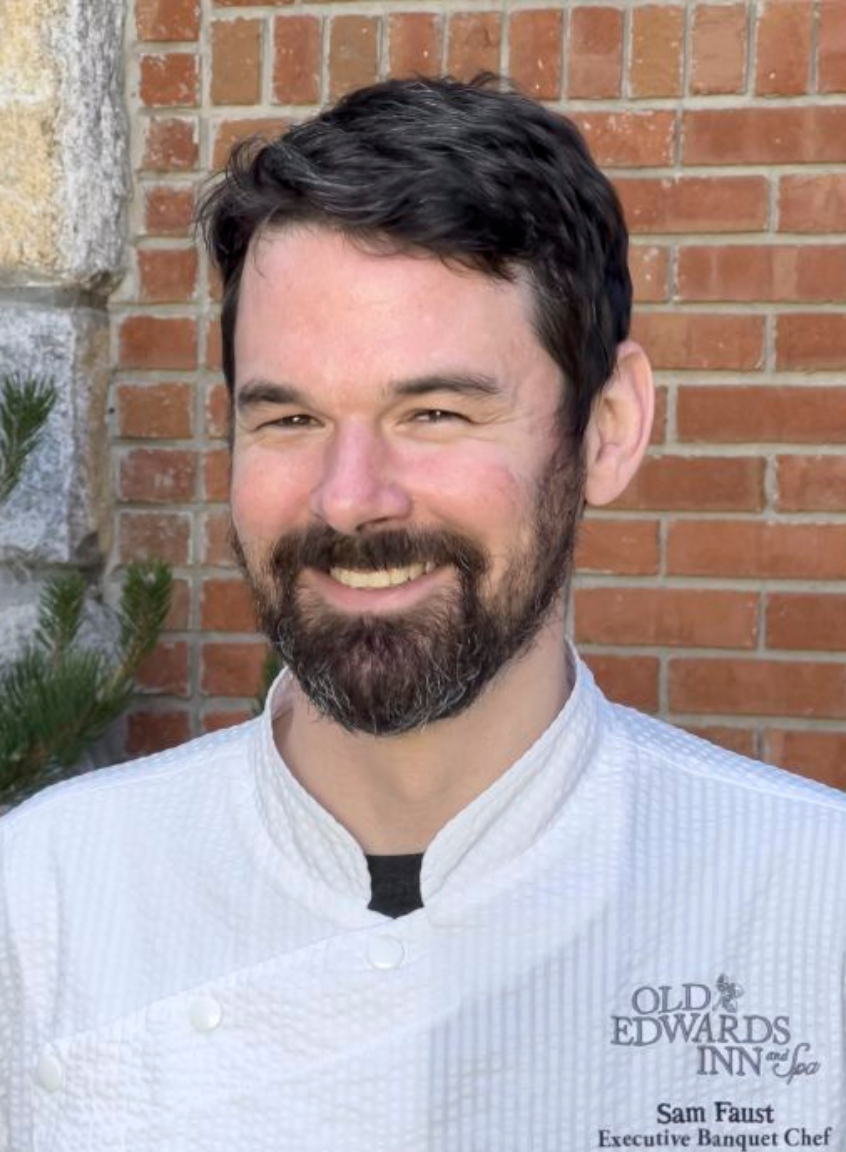 a man smiling for the camera