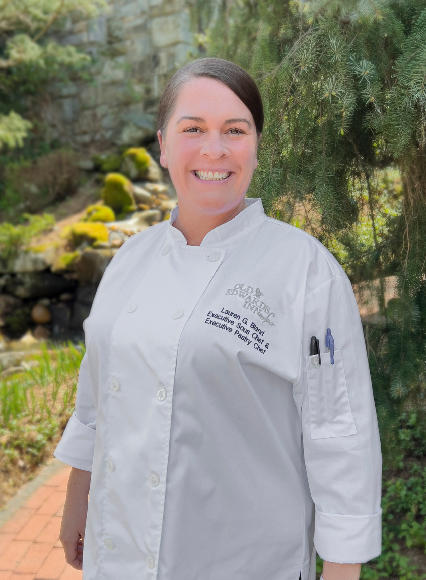 a woman in a white coat