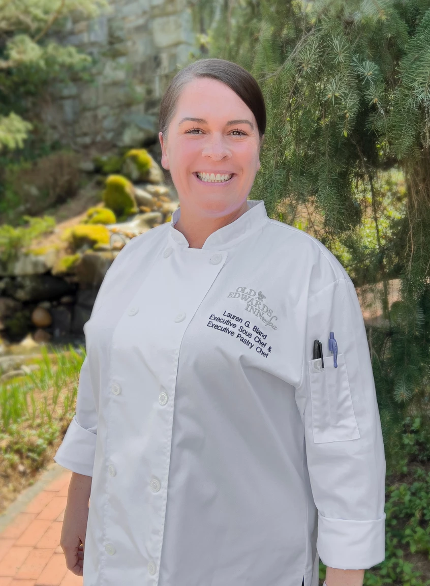a woman in a white coat