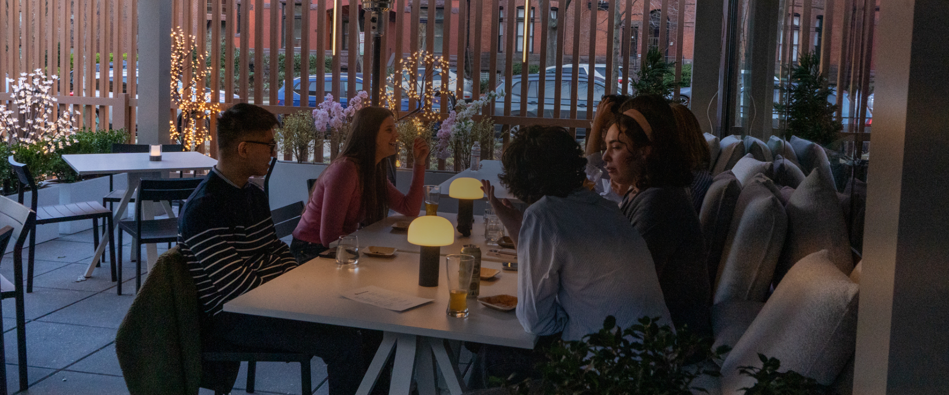 a group of people sitting at a table
