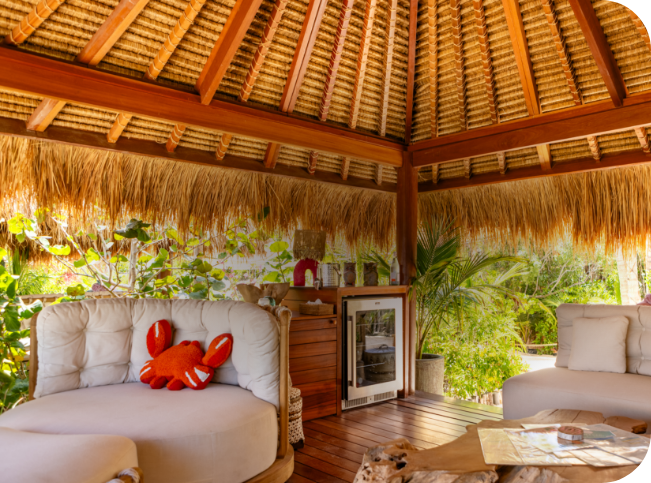 a patio with a couch and a chair