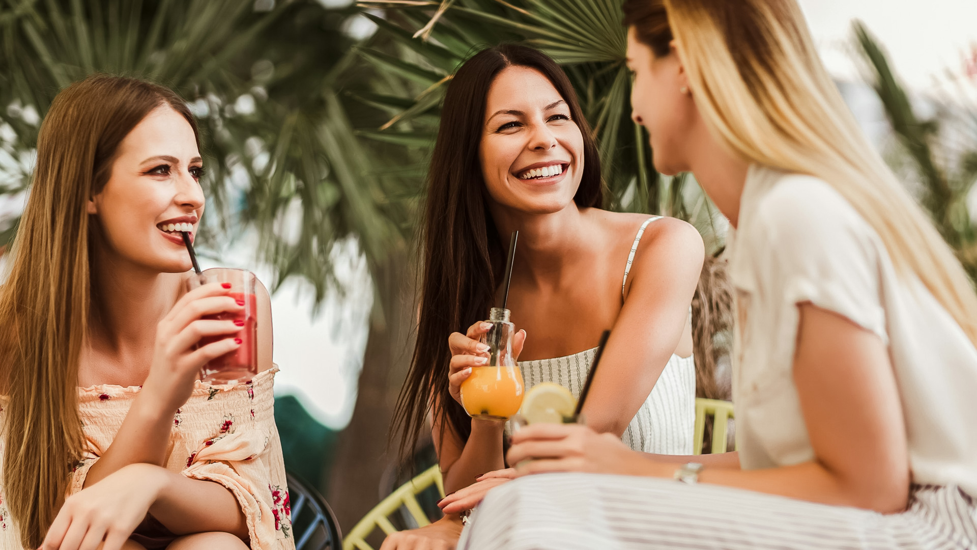 a group of women sitting at a table