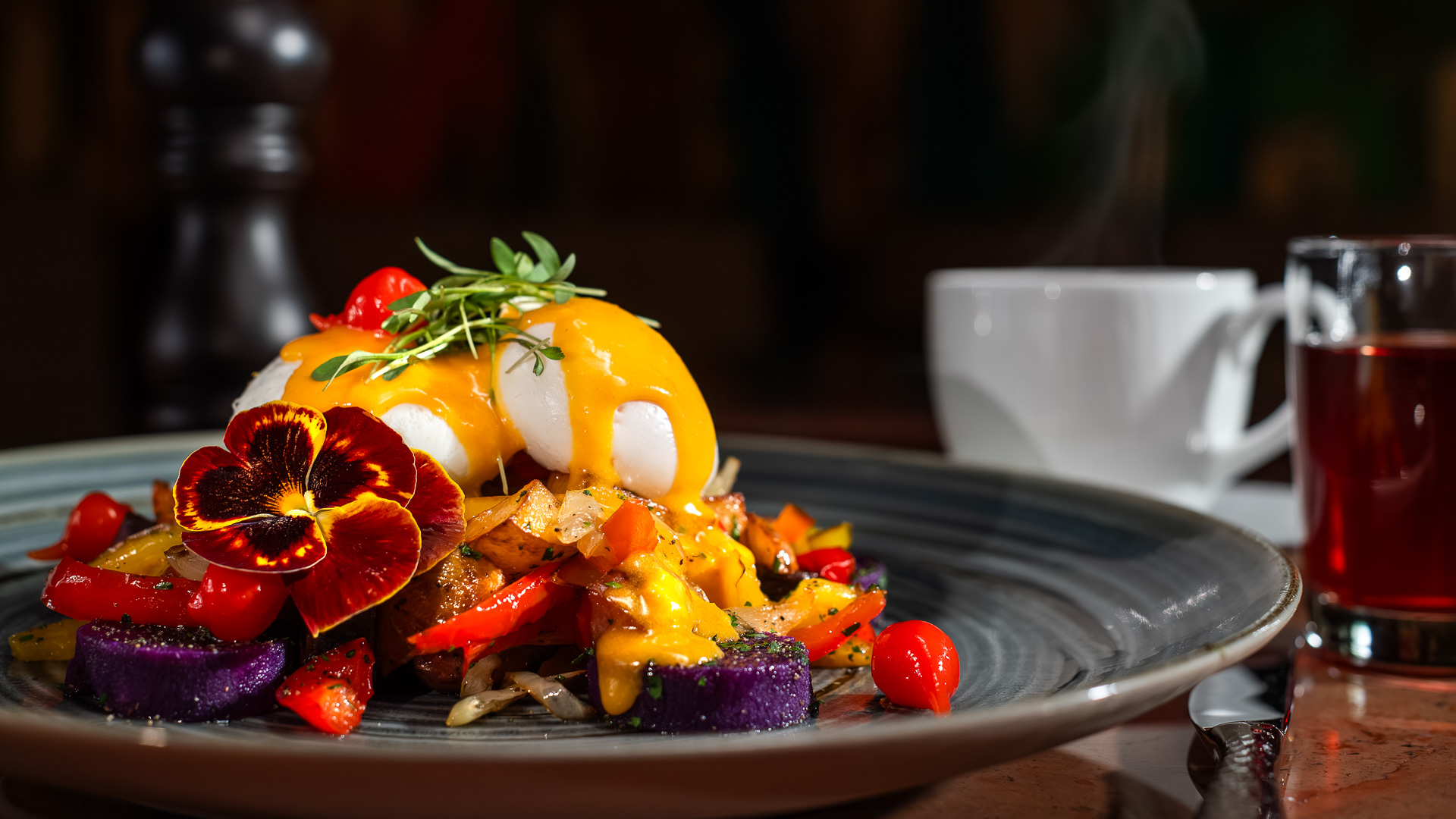 a plate of food with a cup of coffee