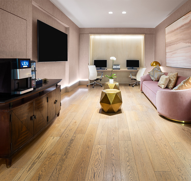a room with a couch and a coffee machine